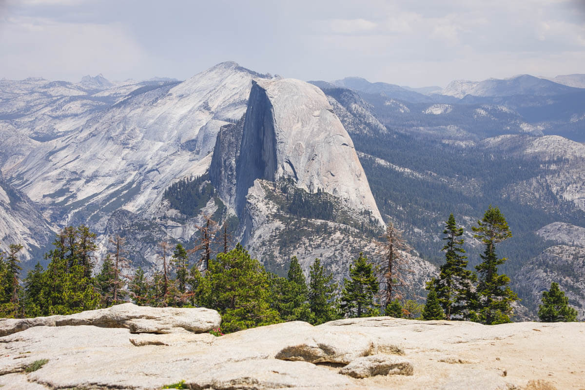 A view of Half Dome from the summit of the Sentinel Dome Trail in Yosemite National Park.