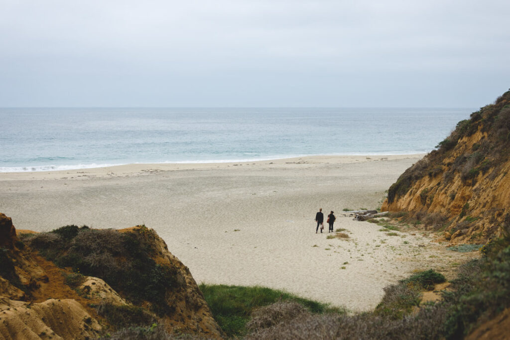 Couple at McClures Beach one of the beaches in Point Reyes, California