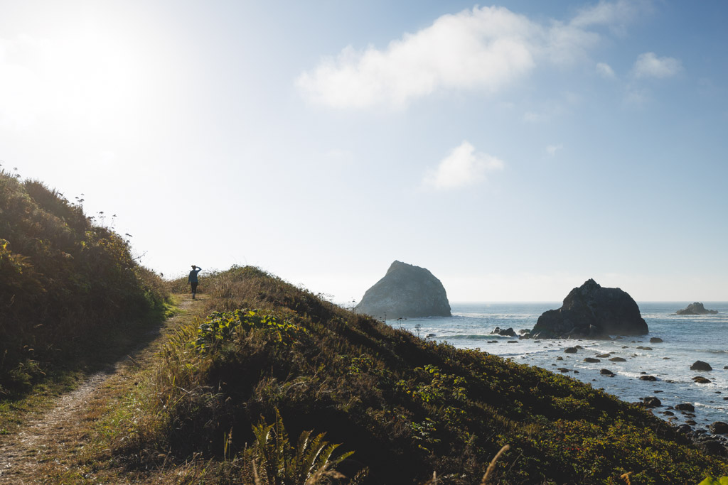 Nina hiking on the Yurok Loop Trail as a things to do in Crescent City. 