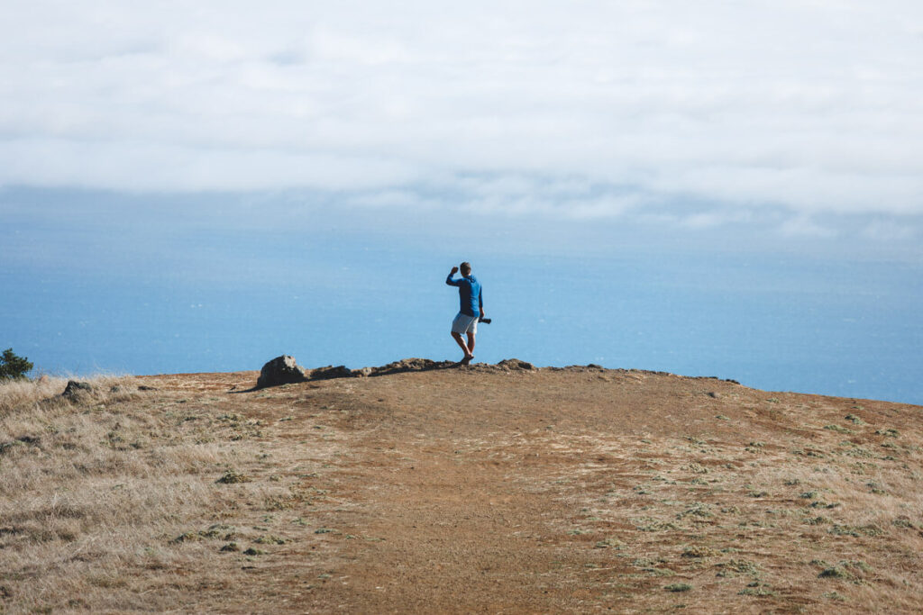 A hiker enjoying a viewpoint along the Dipsea Campfire Loop in Mount Tamalpais State Park.