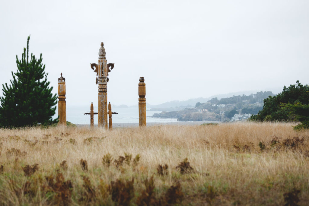 Traditional totem poles overlooking the coastline in Gualala Point Regional Park.