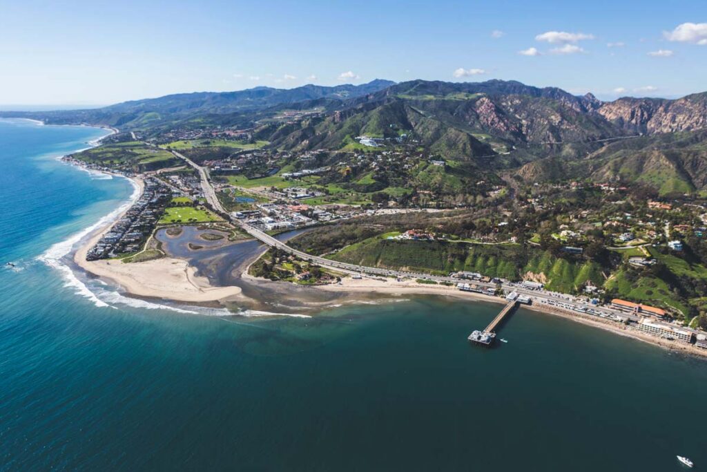 Aerial view of Malibu Pier and Surfrider Beach near Los Angeles, California.