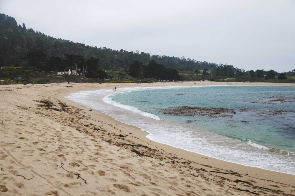 An empty beach on an overcast day along the Carmel Meadows Trail.