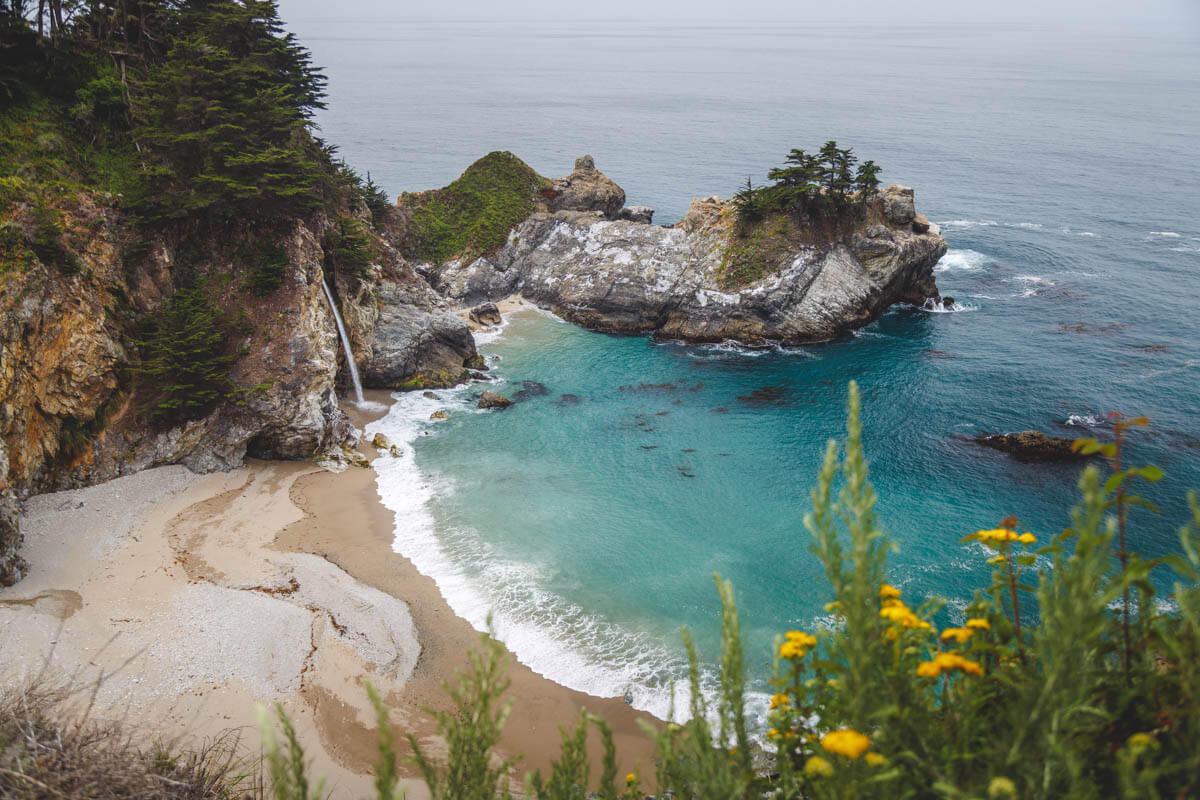 Overlooking McWay Falls and the blue ocean water of the cove it's found in.
