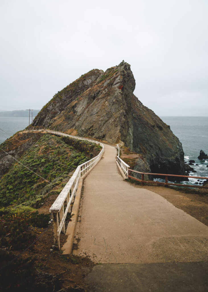 Point Bonita Lighthouse trail curving round the cliffside in San Francisco.