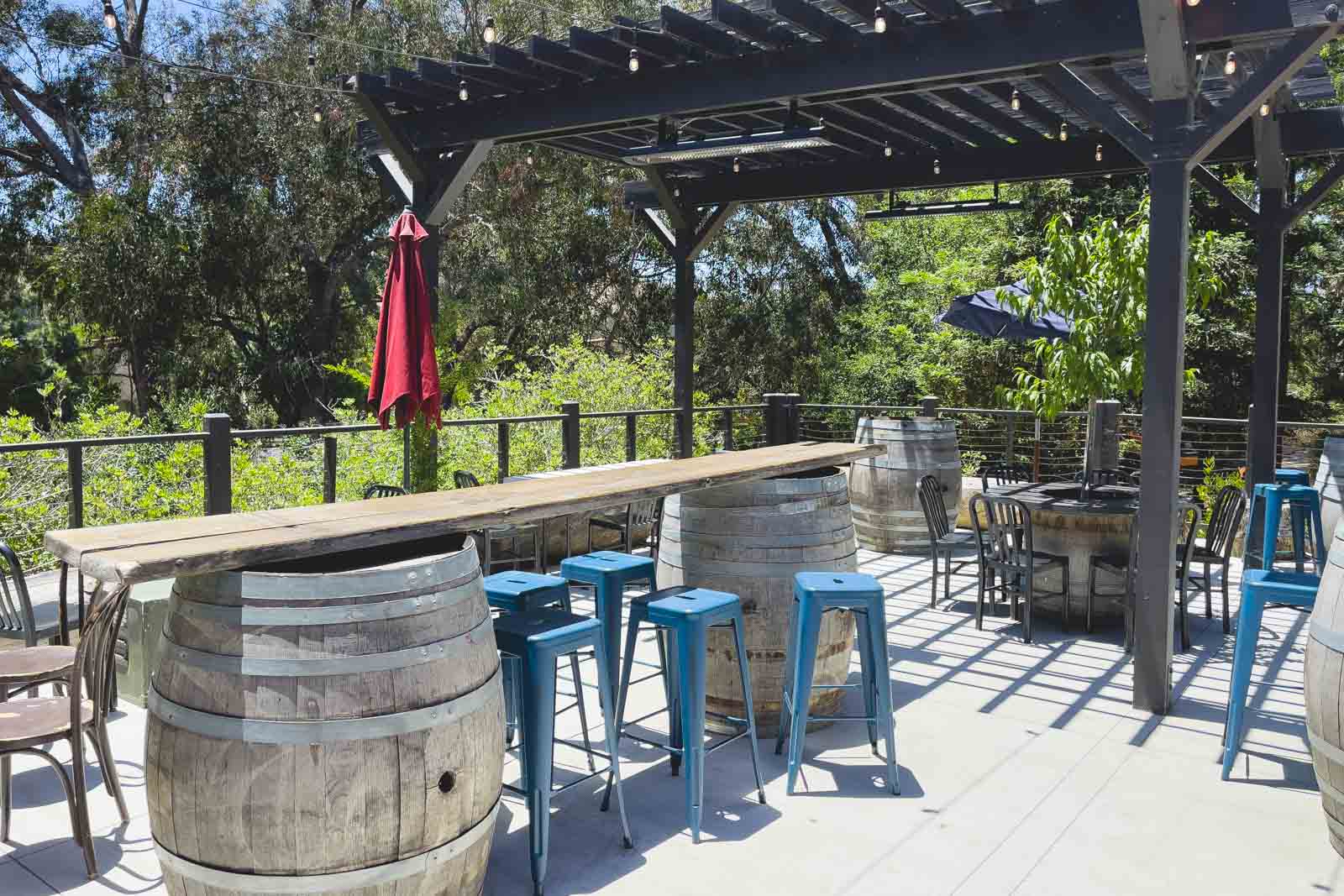 The beer garden at Bang the Drum Brewery in the sun in San Luis Obispo.