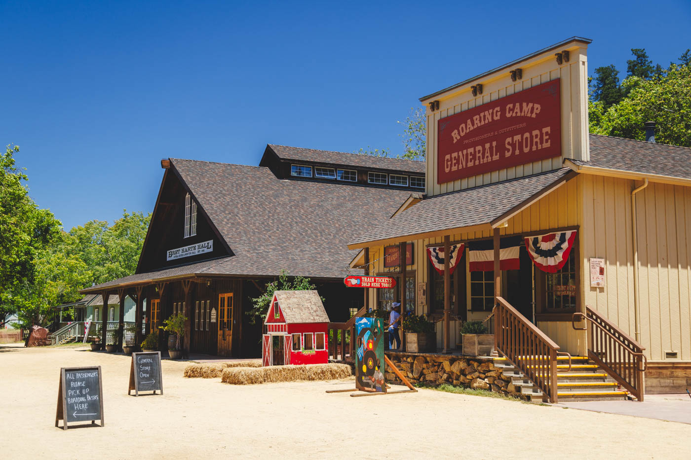Old western looking general store in Roaring Camp Station town on a sunny day.