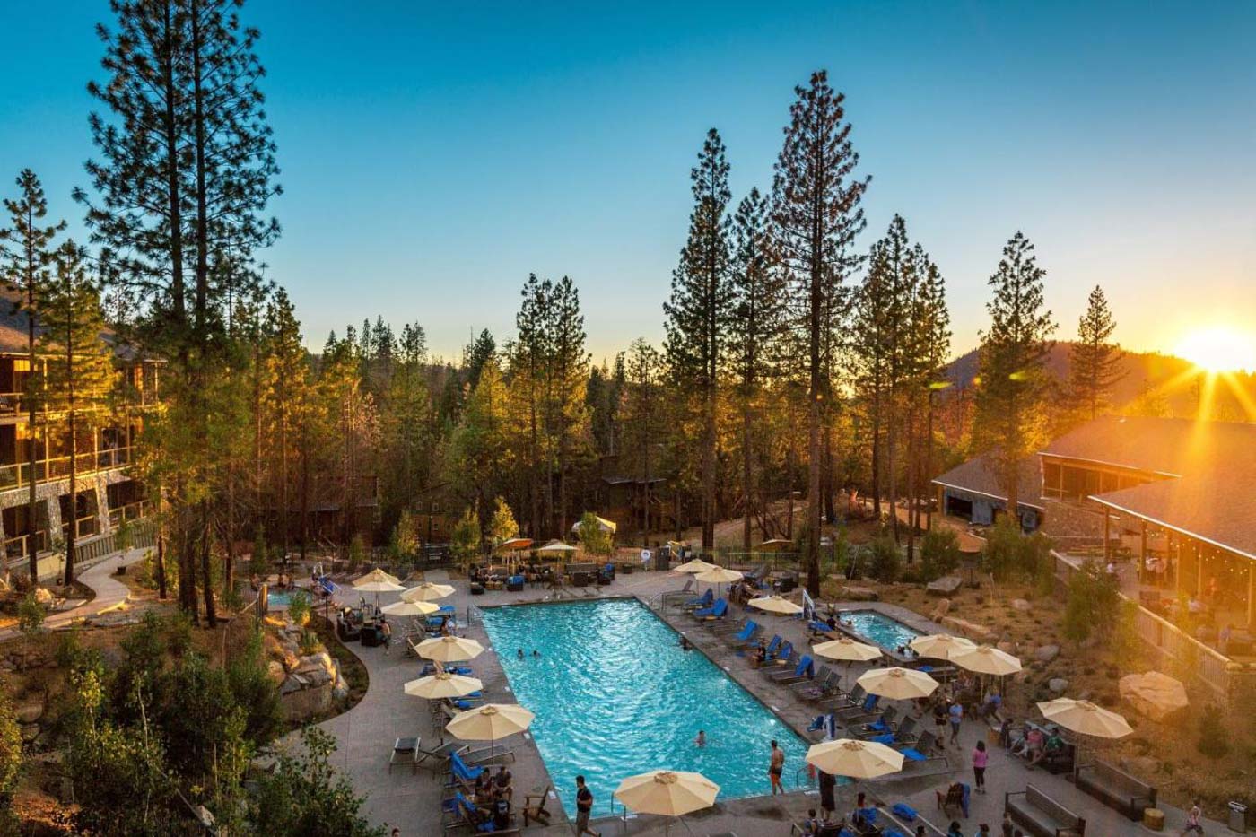 Sunlight over the pool area of Rush Creek Lodge in Yosemite.